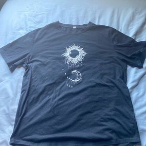 Black t shirt with sun moon and stars design